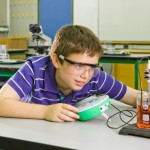 boy doing chem experiment